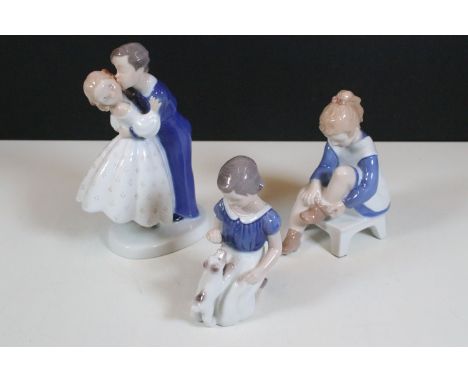 Bing and Grondahl, Denmark figurines to include 'Girl tying shoe' 2373, 'Kissing couple' 2162 and 'Girl with puppy' 2316, all