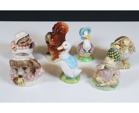 Beswick Beatrix Potter figurines to include 'Squirrel Nutkin', 'Mr Drake Puddleduck', Mr Aldermon Ptolemy', 'Jemima Puddleduc
