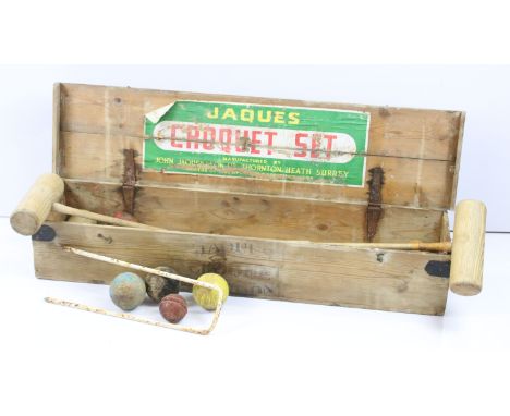 Jacques of London vintage croquet set comprising four mallets, six hoops, marker stick and four coloured balls, contained in 