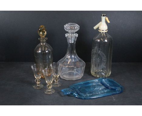 Dunhill crystal decanter together with a Schweppes glass soda syphon, flat gin bottle and amber glass decanter with three she