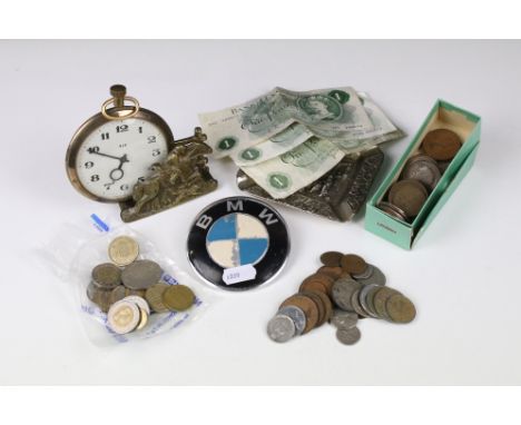 A small group of mixed collectables to include coins, banknotes, car badge, white metal ashtray and an oversized pocket watch