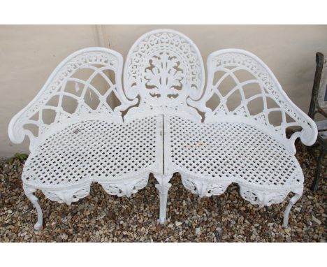 Three seater cast metal garden bench with foliate and scroll centre panel and serpentine lattice work seat, H 84cm, W 140cm