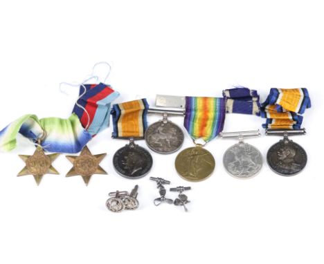 A collection of British World War One and World War Two medals to include two Three British War Medals, Victory Medal, Navy L