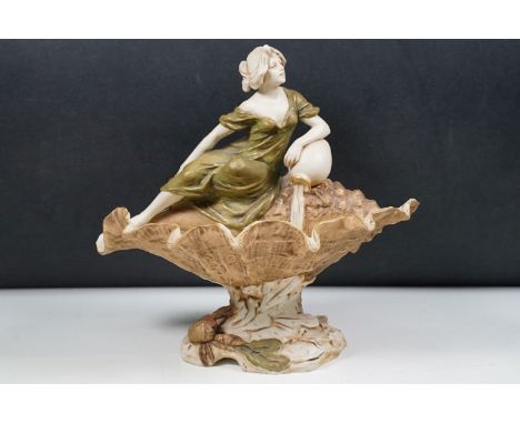 Early 20th century Art Nouveau Royal Dux Bohemia porcelain lady in conch shell figurine on raised base, 26cm