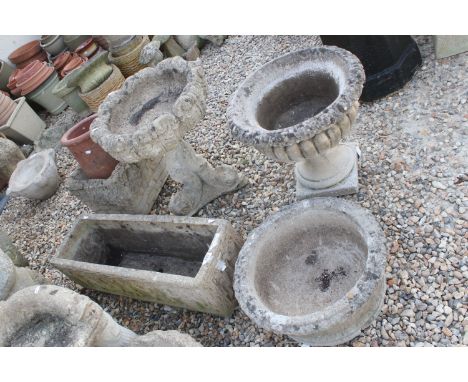 Reconstituted stone bird bath with fish detail base together with a brick effect planter, footed urn planter, rectangular che