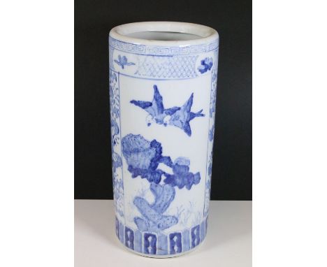 Blue and white chinoiserie ceramic stick/ umbrella stand with hand painted flower and bird design, H 45cm, 20cm diameter
