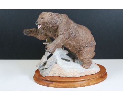 Franklin Mint 'Grizzly' bear hand-painted sculpture on wooden base 
