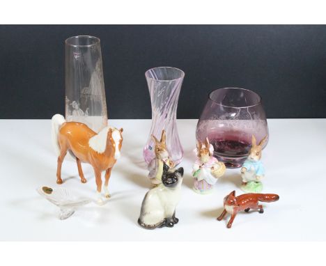 Group of Beswick figurines to include, Beatrix Potter's 'Mr Benjamin Bunny', Peter Rabbit' and ''Mrs Rabbit' together with Si