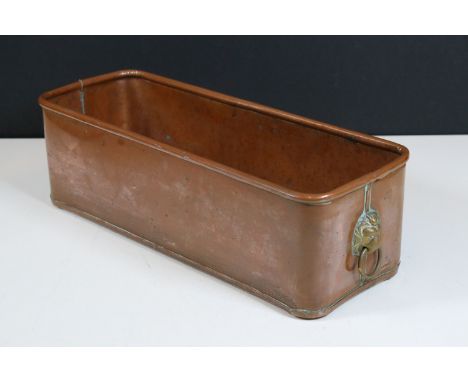 Vintage oblong copper planter with lion head handles 