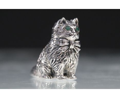 Well cast silver cat figure with emerald eyes 