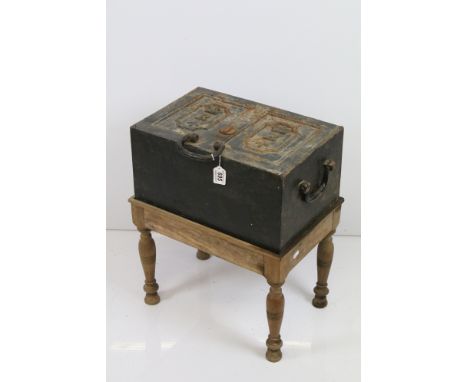 Early 19th Century military issue coaching cast iron strong box safe, with two panels to door showing the crown, an 'R' (Regi