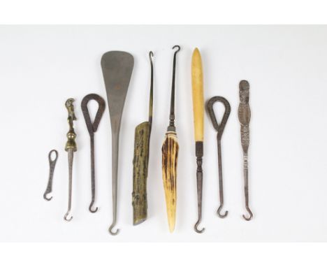 Collection of vintage button hooks, including a Japanese aesthetic brass example with insect on long handle, 19.5cm long (9)
