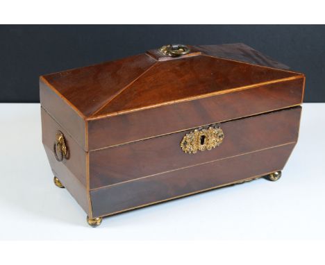 Regency mahogany tea caddy of sarcophagus form with brass loop finial and escutcheon, with two compartments, bone handles and