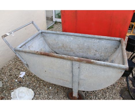 Three wheeled galvanised feeding trough trolley, H 72cm, W 141cm