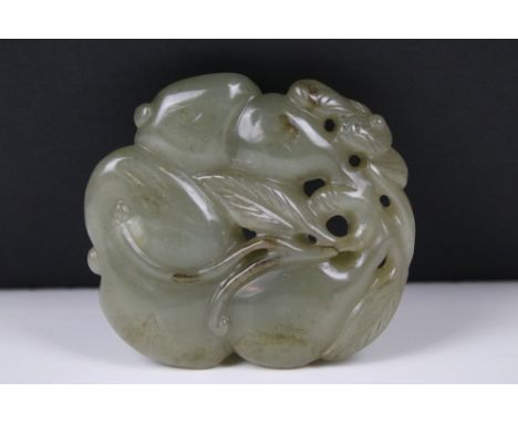 A Chinese carved jade belt / rope buckle, measures approx 80mm x 70mm