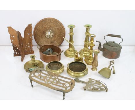 Collection of brass to include coal scuttle with lion paw feet, tongs, tall candlesticks, Chinese pipe, chamber stick, bowls 