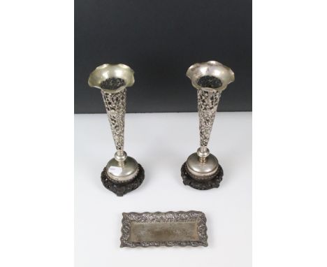 A pair of Chinese silver spill vases with pierced floral decoration together with a white metal dish. 