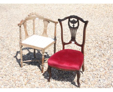 Early 20th century mahogany corner chair with a carved top rail above stretchered base together with an early 20th century ma