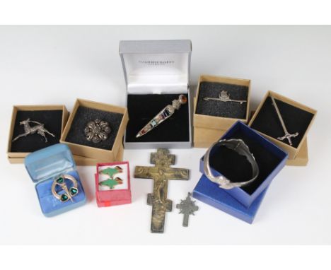A small collection of costume jewellery to include Scottish traditional style brooches together with a set of Thunderbirds cu