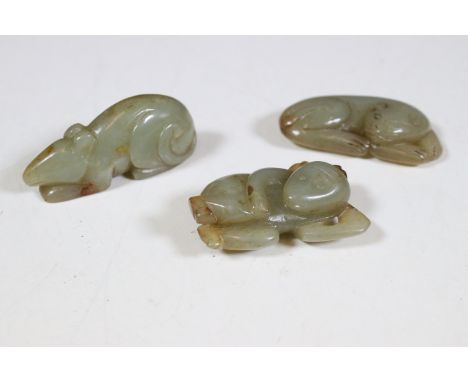 Collection of Chinese jade, comprising: a carved figure of a monkey, 4cm high, a carved figure of a cat, 4cm long and a carve