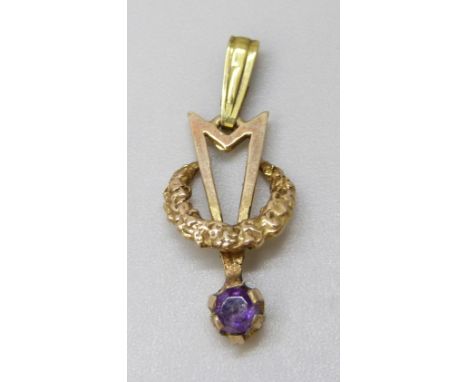 A 9ct gold amethyst set pendant, plated bale, total weight 0.9g