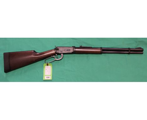 A Walther 'Winchester' lever action CO2 .177 air rifle, in very good condition with original box etc and six magazines, as a 