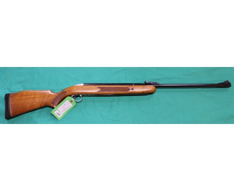 A B.S.A. Airsporter S .22 cal air rifle, Serial No.G.P.00250 (circa 1983) with a camo gun slip and a G10 air pistol, as a pos