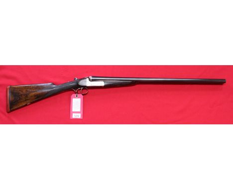 A 12 bore side-by-side B/L/E shotgun with 26" barrels by Midland Gun Co, overall a good serviceable shotgun, Serial No.108187