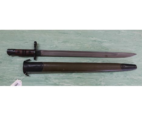 A model 1917 Enfield bayonet by Remington with scabbard dated 1918, both in exceptional condition