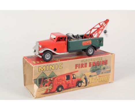 A boxed Triang minic tow truck in fire engine box (missing end flaps)