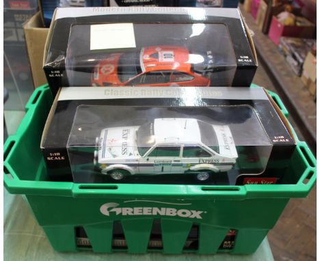 Four boxed Sunstar 1/18th scale rally cars Ford Focus WRC Solbere, Menkerud Monte Carlo 2008, Ford Escort MkIII Clark, Pegg 1