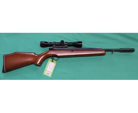 A Webley Tracker .22 sidelever air rifle with scope, in overall good condition, as a post 1939 air weapon the restrictions of