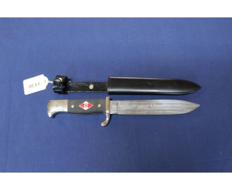 A reproduction Hiltler youth knife with scabbard