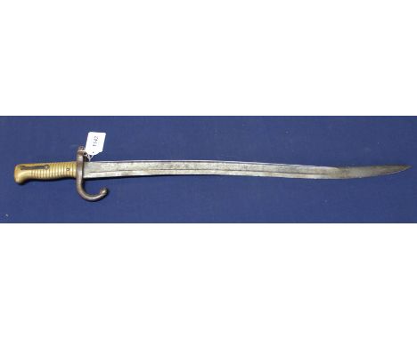 A brass hilted French model 1866 sabre bayonet, dated 1870 (no scabbard)