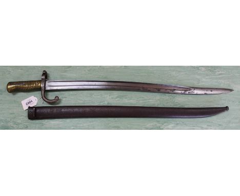 A brass hilted sabre bayonet complete with scabbard