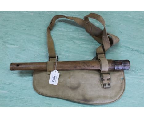 A WWII era '37' entrenching tool with canvas case