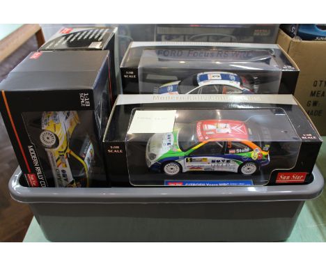 Six boxed Sunstar 1/18th scale rally cars Ford Focus RS WRC Wilson, Orr Wales 2006, Ford Focus RS WRC Duval, Prevot Mexico 20