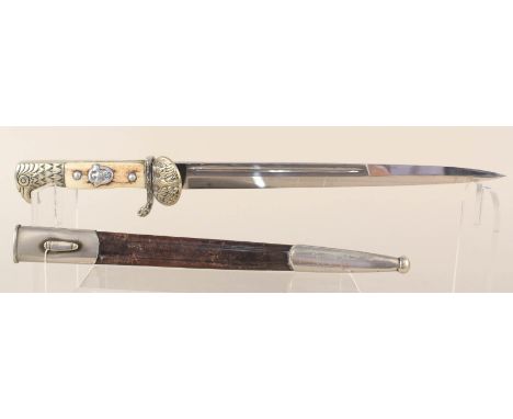 A German Third Reich era Police bayonet/sidearm with scabbard by W.K.C., this rare variant has 11 1/4" blade (not shortened) 