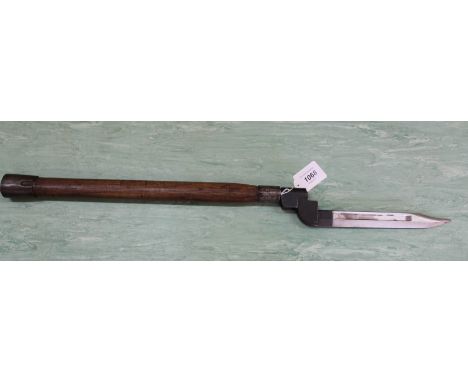 A post WWII No.9 bayonet on entrenching tool shaft (dated 1944)