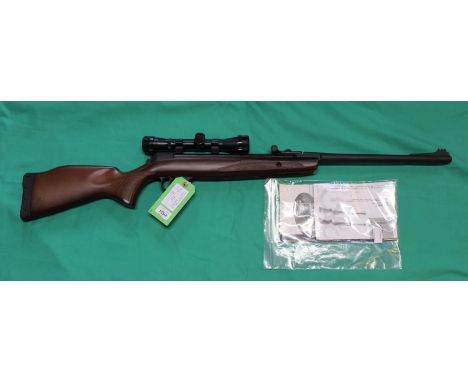 A Browning X-blade Hunter .22 cal air rifle with B.S.A. scope and manuals, as a post 1939 air weapon the restrictions of the 