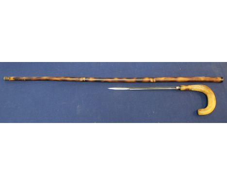 A good 'dagger stick' with horn grip and 9 3/4" blade, in overall good condition