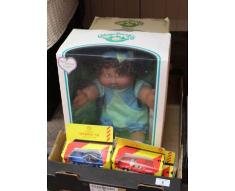 Two boxed Cabbage Patch kids dolls plus four shell model cars