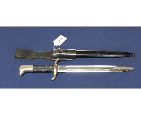 A German Third Reich era Firemans dress sidearm by Eickhorn, complete with scabbard and leather frog