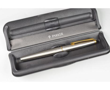MODERN STAINLESS STEEL PARKER 45 FLIGHTER FOUNTAIN PEN with gold plated trim, in original box