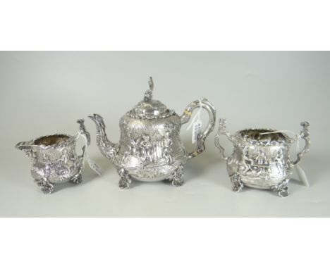 VICTORIAN SILVER THREE PIECE TEA SET, comprising teapot, sucrier and cream jug overall repousse decorated in rare Teniers rev