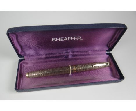 VINTAGE GOLD FILLED SHEAFFER IMPERIAL SOVEREIGN FOUNTAIN PEN with diamond pattern &amp; gold plated trim, fitted with a 14k s