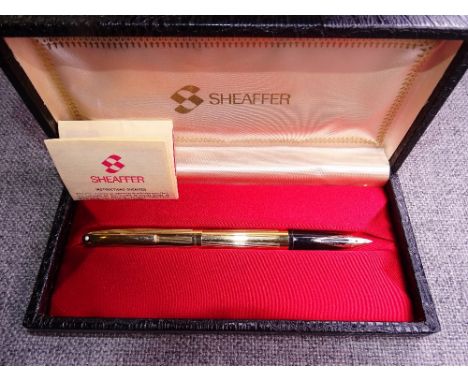 VINTAGE GOLD FILLED SHEAFFER IMPERIAL TRIUMPH FOUNTAIN PEN with lined pattern, gold filled trim &amp; fitted with a 14ct soli