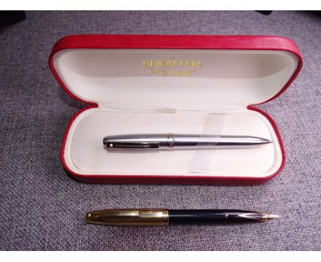 MODERN BRUSHED STAINLESS STEEL SHEAFFER PRELUDE BALLPOINT PEN with chrome trim, inscribed with 'Tesco Into the Next Millenniu