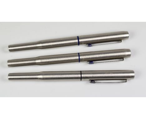 THREE VINTAGE STAINLESS STEEL PARKER 25 ROLLERBALL PENS with blue trim