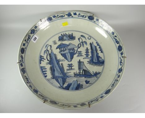 LARGE CHINESE PORCELAIN BLUE &amp; WHITE WALL CHARGER with central panel depicting junk boat, island, pine trees &amp; the mo